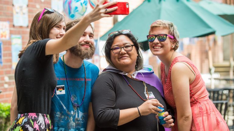 Students taking a selfie during Pacific's Pride celebration