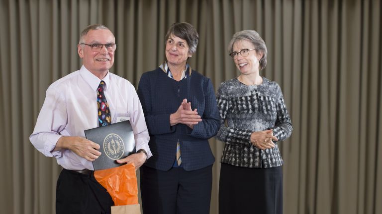 Gene Pearson receiving award