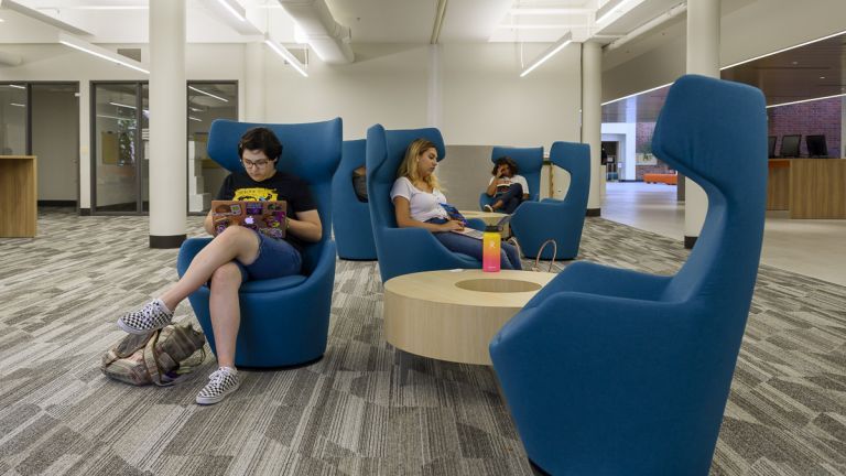 students studying in library