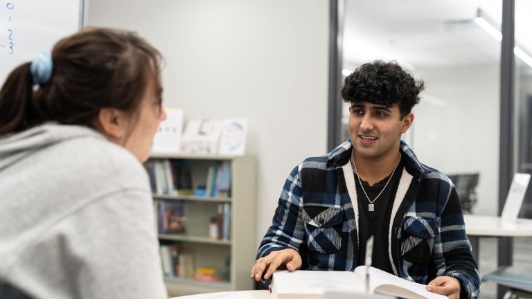 student tutoring another student