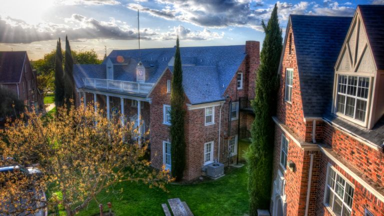 sunflare over fraternity buildings