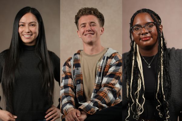 three pacific alumni smile at the camera
