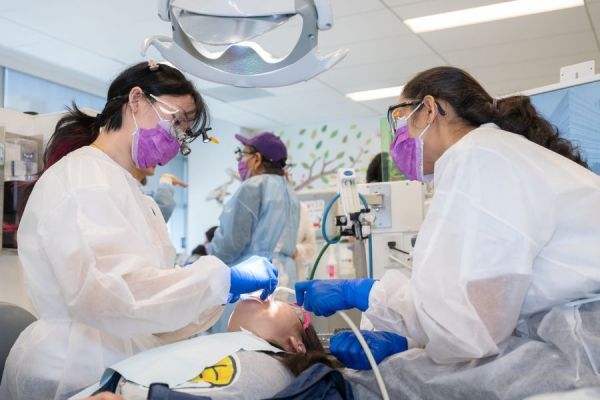 students do dental work in an operatory
