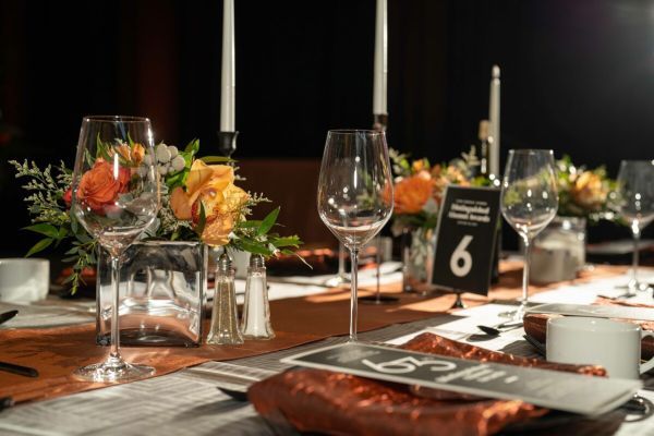 a set table at an elegant event in the DUC ballroom