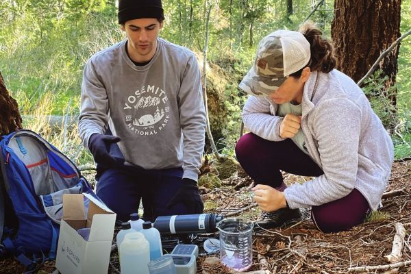 pacific professor and graduate student doing research