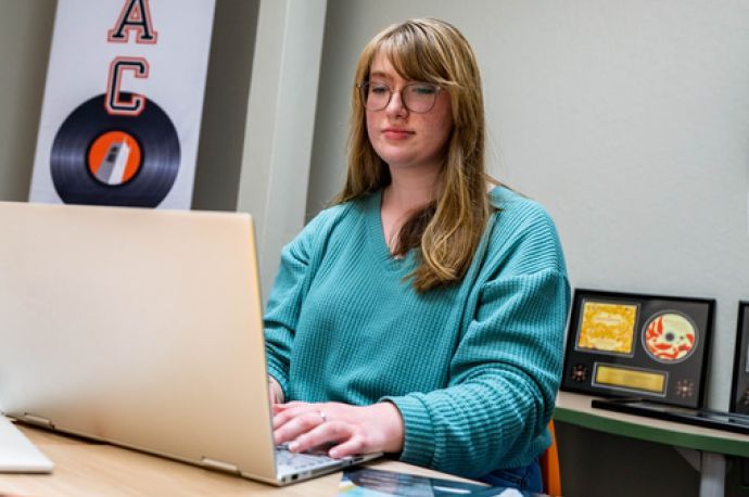 college student with a laptop