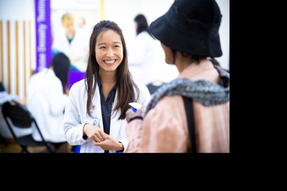 PharmD student with patient at Medicare Part D Outreach Clinic