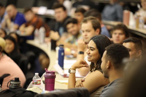 A group of law students sits in a lecture hall.