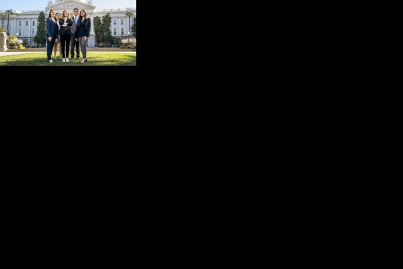 A group of students in front of the CA Capitol Building