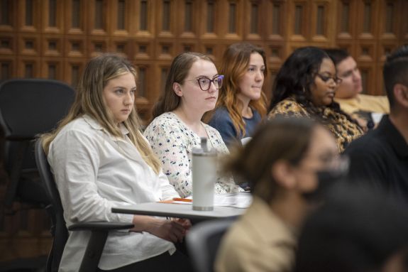 students sit in for an info session 