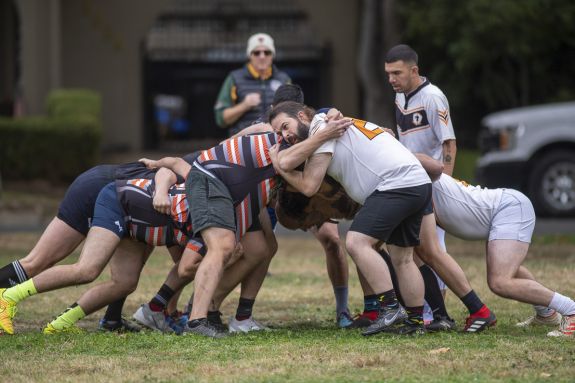Law students play rugby.