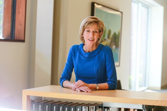 Professor Leslie Gielow Jacobs in the library