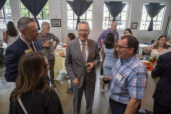 A group of people mingling at a mixer