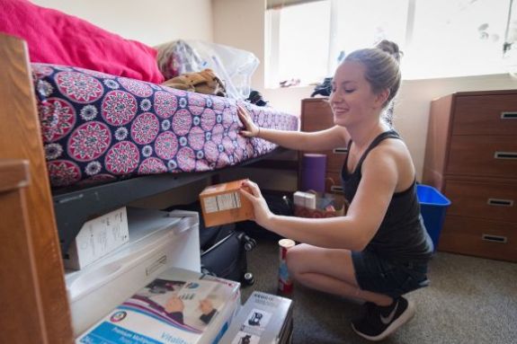 Female Student Moving In