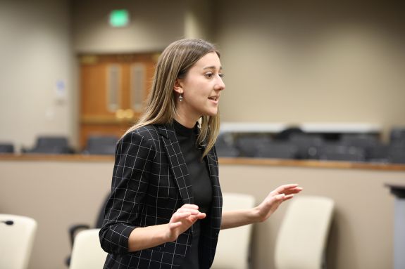 A law student speaks to a pretend jury.