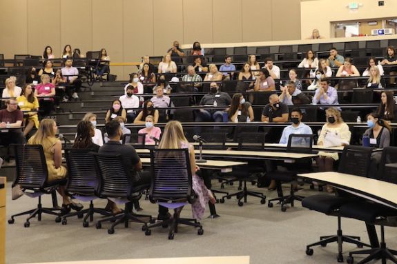 Students listen in on an info session 