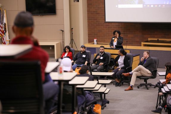 Speakers speaking at an event 