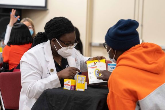 PharmD students with patient at Diabetes Care Clinic