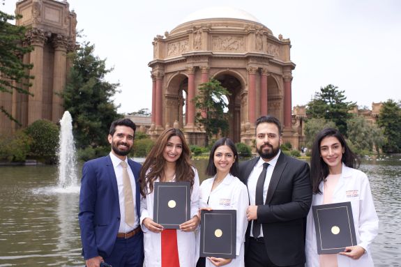 group standing in front of the Palace of Fine Arts