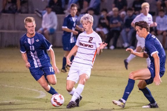 Cory Johnson battles for a ball at midfield for the Tigers