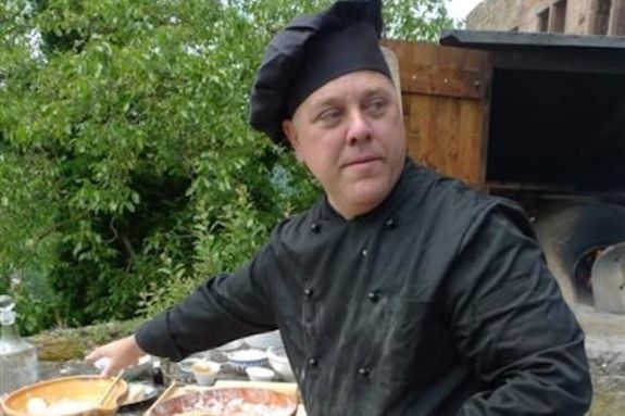 Ken Albala in a black chef coat and hat