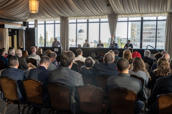 Group of people sitting at a lecture event.