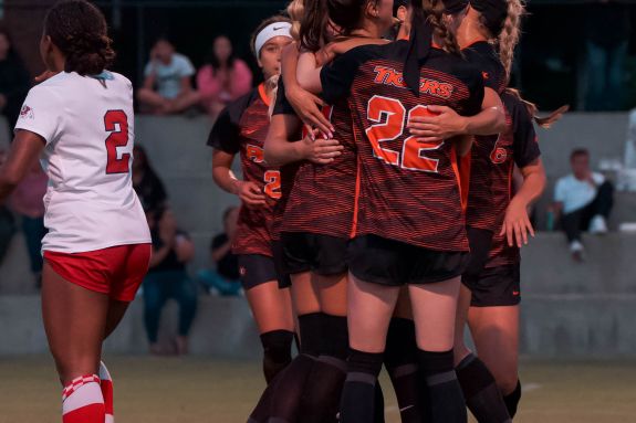 Women's soccer celebrates a goal
