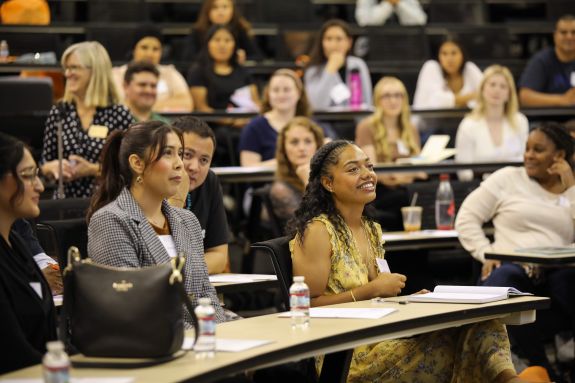 Students listen in on an info session