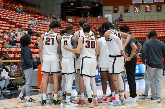 Men's basketball team huddle