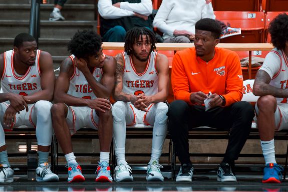Pacific men's basketball team bench