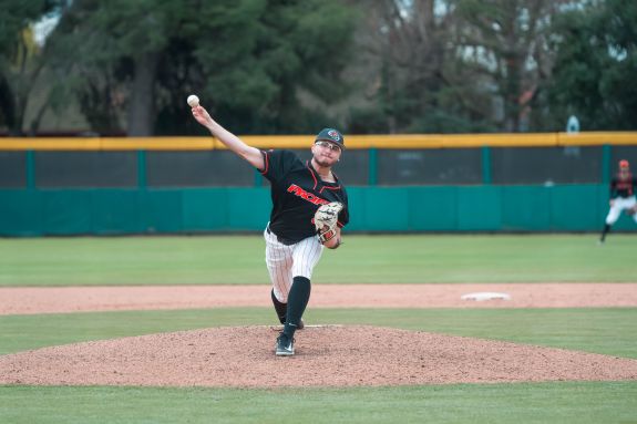 Pacific baseball player throws the ball.