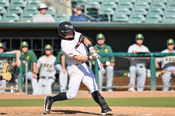 Pacific baseball player hits the ball.