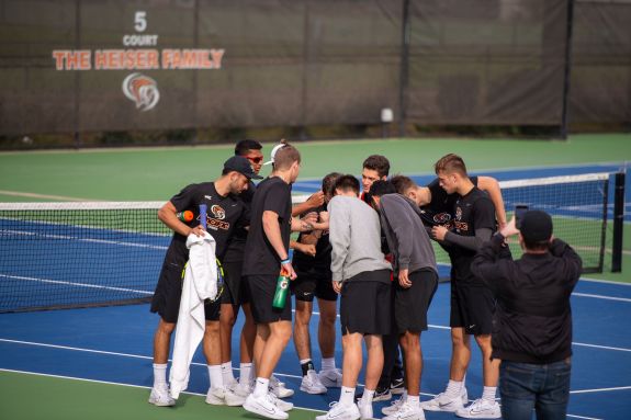 Men's tennis huddle