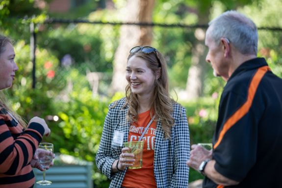 student talking and networking at a mixer.