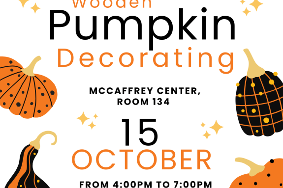 Poster featuring painted gourds surrounding text reading: Please join us for wooden pumpkin decorating, McCaffrey Center, Room 134 15th of October from 4pm to 7pm