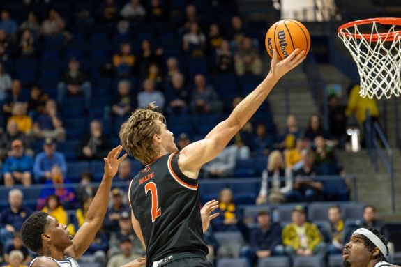 Player goes for a layup.