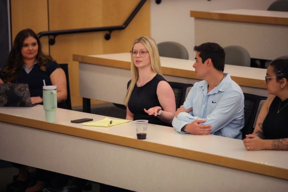 Students discussing with each other.