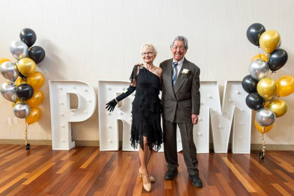 Two guest attending the senior citizens prom 