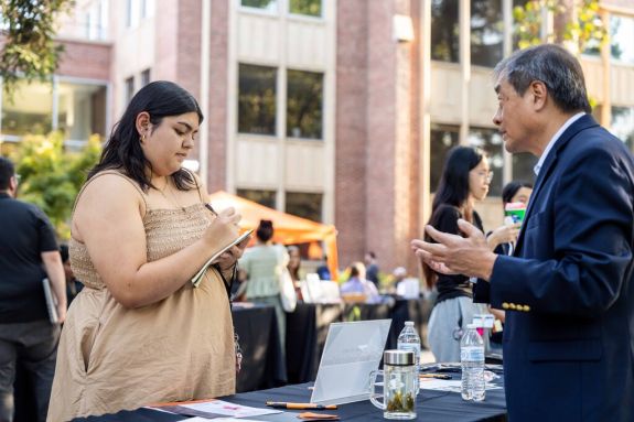 Faculty speaking with prospective student