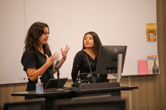 Speaker explaining a topic.