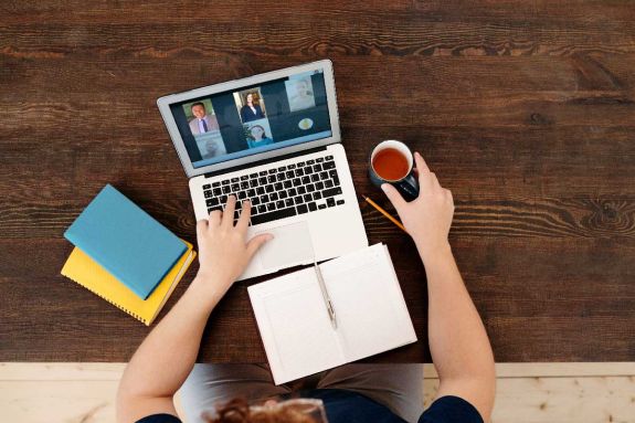 Photo by Diva Plavalaguna: https://www.pexels.com/photo/man-having-a-virtual-meeting-6147390/