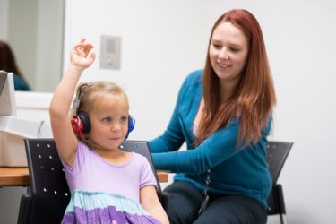 a student working with a patient