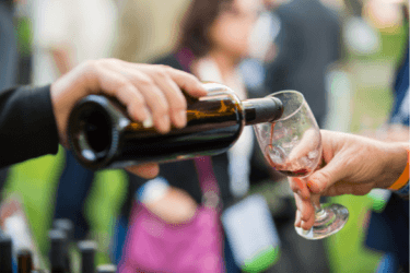 Wine being poured into a glass