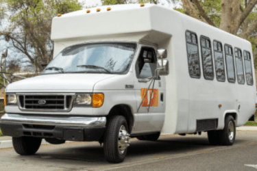 Image of a white shuttle vehicle