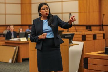 Law student competing in a trial advocacy competition.