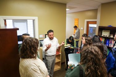 Man speaks to students 