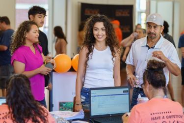 Students checking in for Week of Welcome in the DeRosa University Center