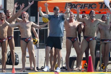 Head Coach James Graham and team celebrating.