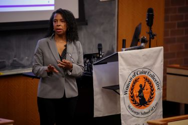 Woman gives a lecture.