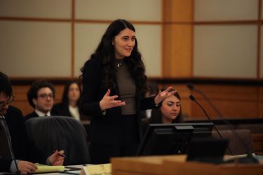 Speaker engaging with students.